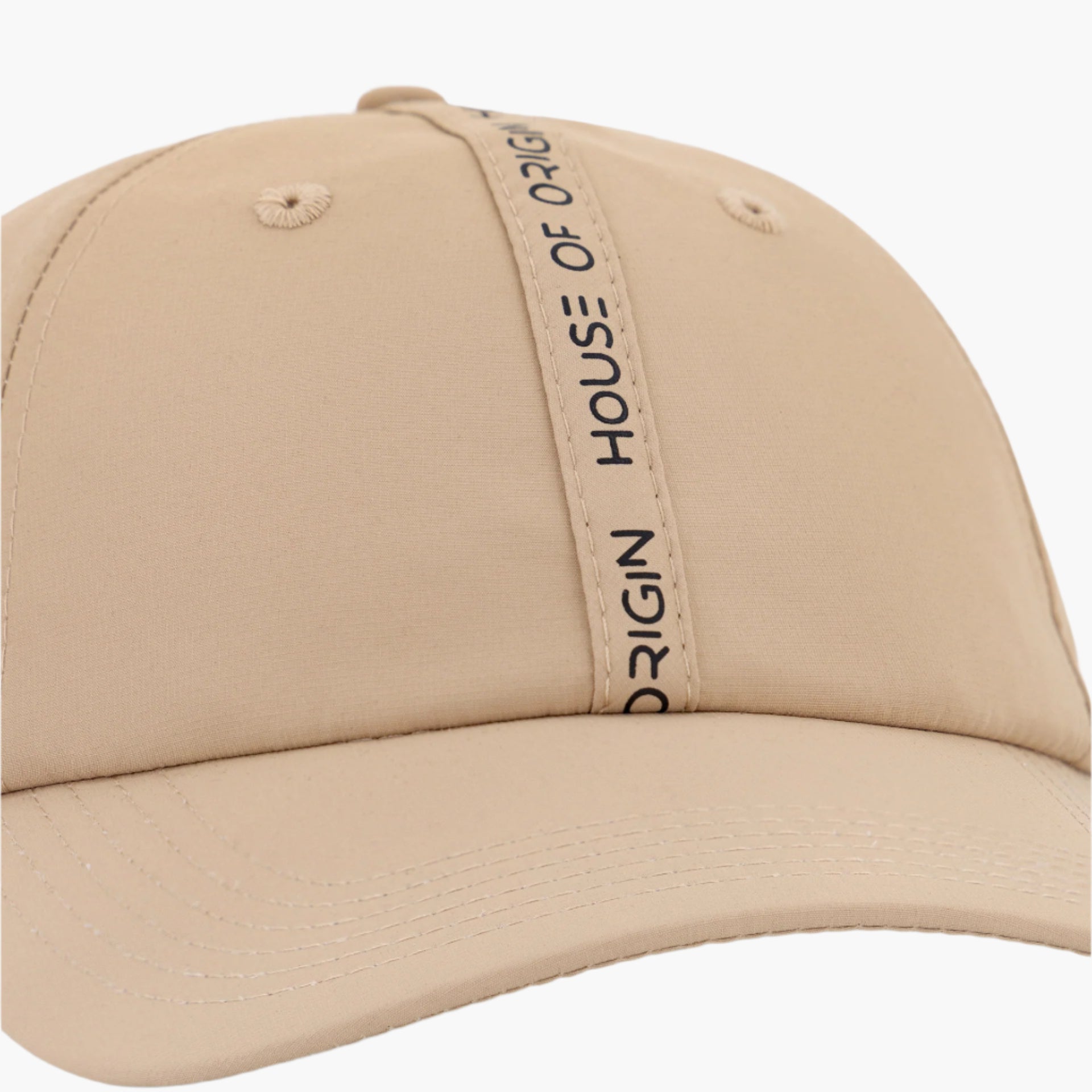Beige cap with 'House of Origin' logo 